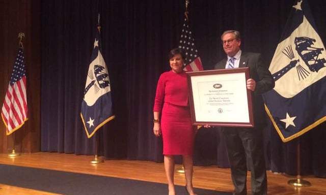 US_Secretary_of_Commerce_Penny_Pritzker_presents_Management_consultant_Ed_Marsh_receives_2016_Presidential_E_Award_for_Export_Excellence.jpg